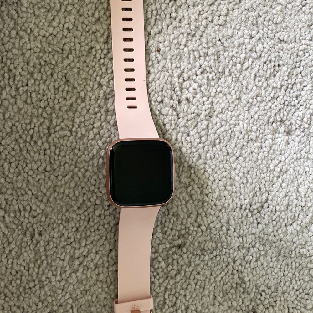 Rose gold Fitbit